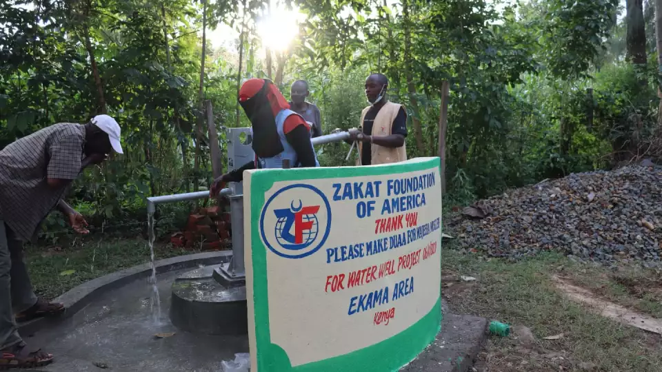 A crew member tastes the water, which is all the more refreshing after hard work. The water is clean. Praise be to God. – Zakat Foundation of America