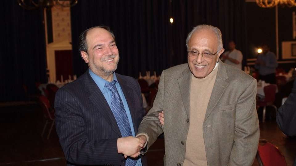 Mr. Halil Demir (left) and Mr. Ahmed Kathrada (right) at the Zakat Foundation Solidarity Banquet (May, 2009).