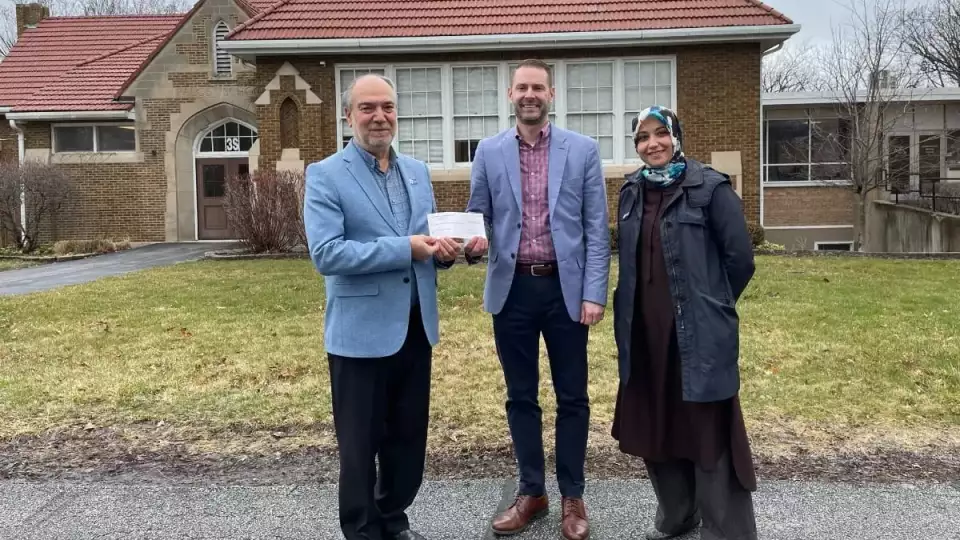 Palos 118 Superintendent Dr. Anthony Scarsella (center), presented a check to Zakat Foundation of America Director Khalil Demir (left), and Lena Tleib, Advertising and Events Coordinator, for earthquake relief efforts in Syria and Turkey. (Palos 118)
