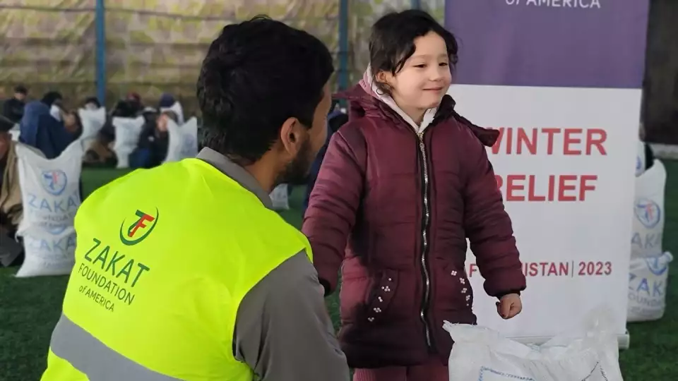 Your warmth given to protect a child from the winter chill / تبرعاتكم توفر الدفء لحماية الأطفال من برد الشتاء