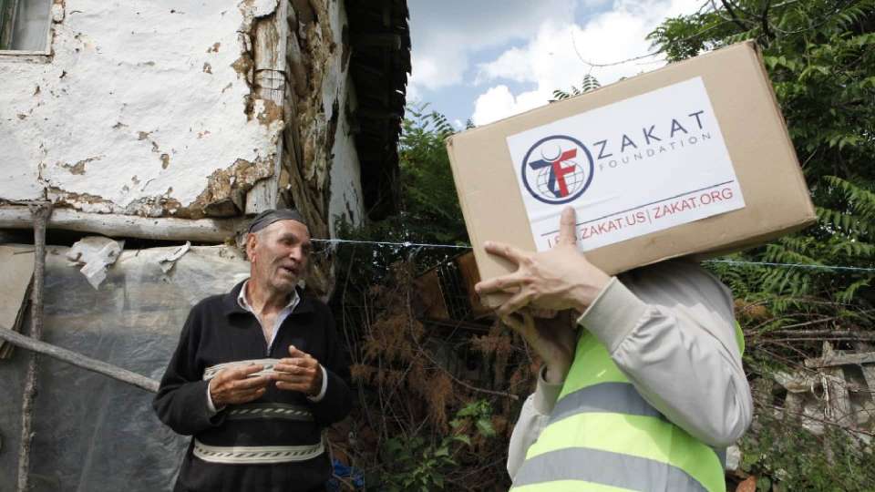 Donations being handed to a man