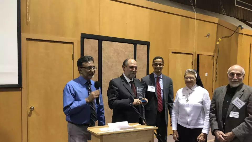 halil demir receives swift faith in humanity award