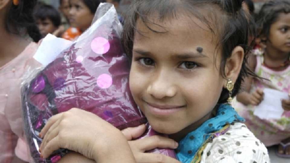 2011 ramadan bangladesh girl holding package  large