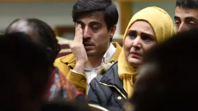 Mehmet Deniz of Hoffman Estates wipes away a tear as he watches a video of earthquake devastation in Turkey. Deniz said he lost over 100 family members in Antakya, Turkey. Rick West | Staff Photographer