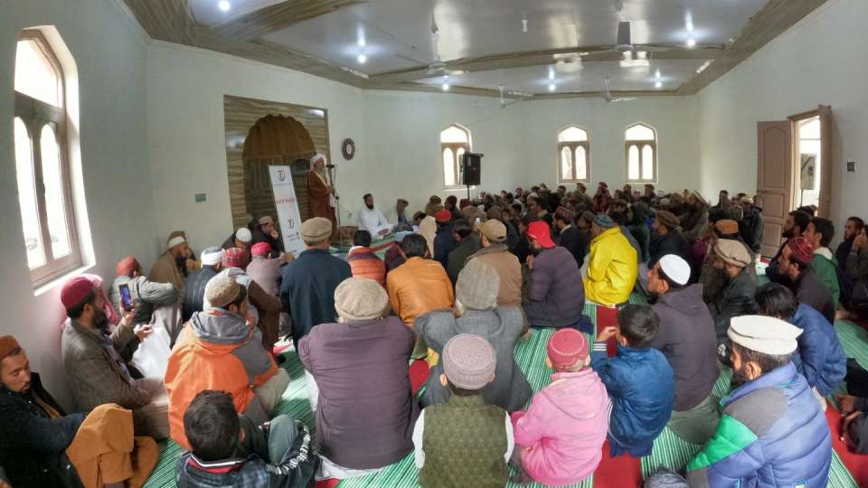 Community members attend prayer at newly build mosque / صلاة الجماعة في مسجد جديد