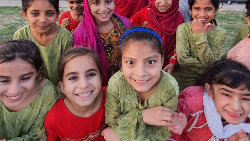 Young girls excited for their newly built orphange / فرحة الفتيات اليتامى بالمبنى الجديد لدار الأيتام