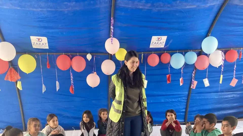 Children in the play tent at after the 2023 earthquake / لحظات من اللهو واللعب للأطفال في قرية الخيام