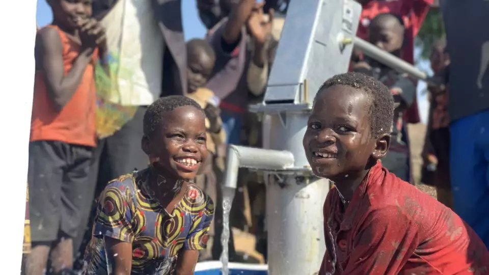 Clean water means happy and healthy children