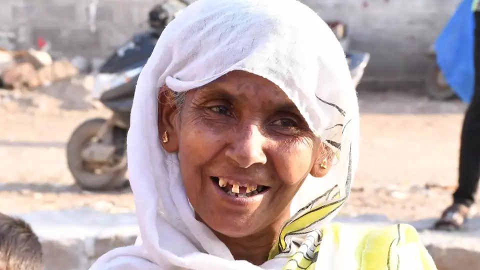 Gratitude with a smile for warm Ramadan food