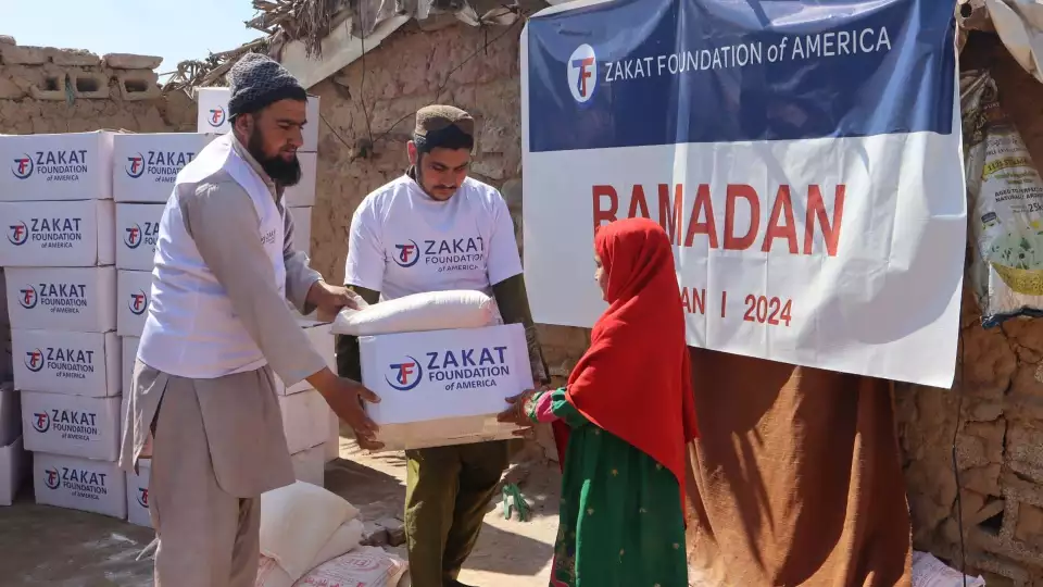 Ramadan food packages for families in Pakistan / توزيع الطرود الغذائية الرمضانية على العائلات الباكستانية