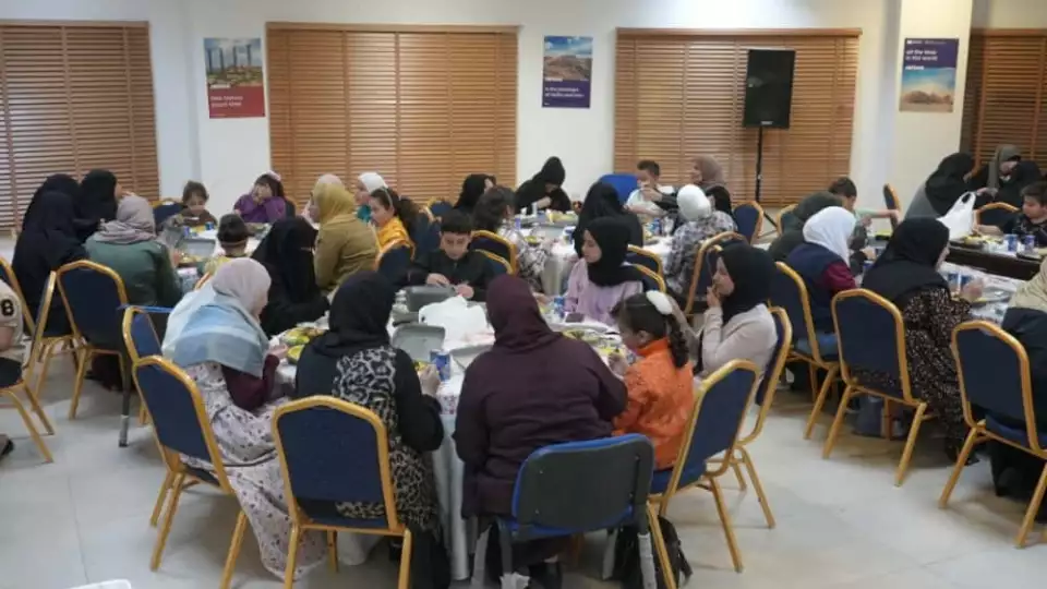 Families in Jordan enjoy an iftar meal