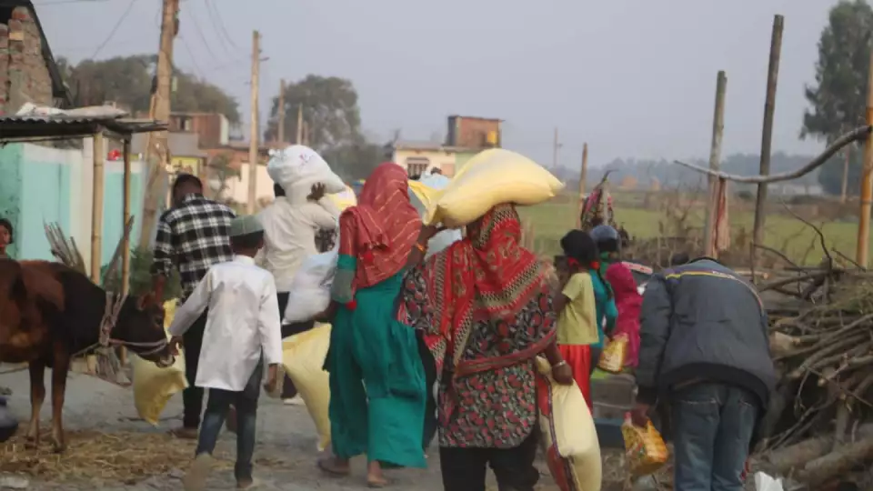 Families leave with their nourishing food packages