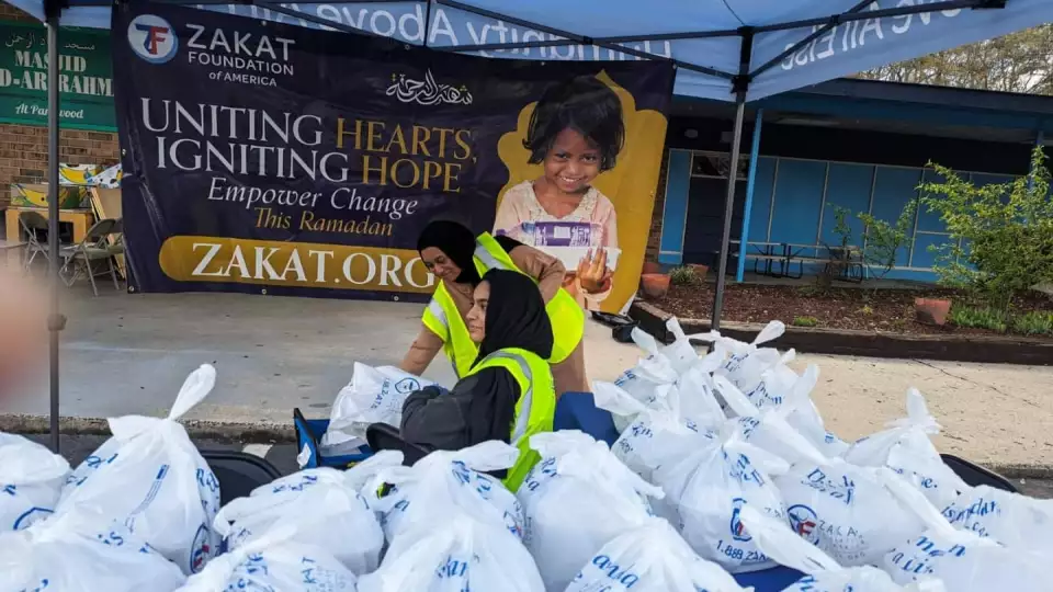 North Carolina volunteers wait to distribute meals