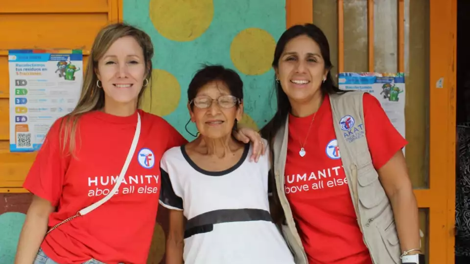 ZFA staff with recipient in Argentina