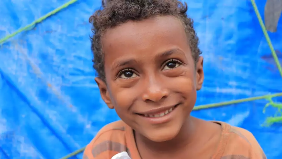 A Yemeni boys eyes reflect joy and gratitude