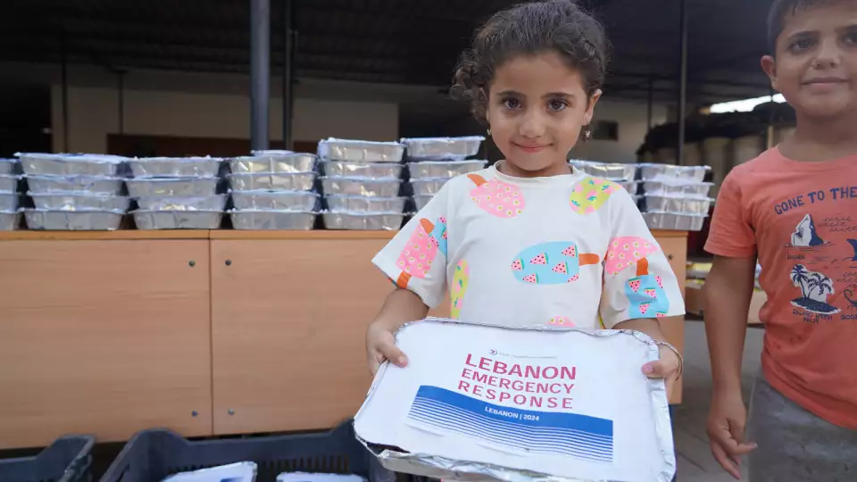 Chicken, rice, fruit, dates and sweets bring smiles in Lebanon