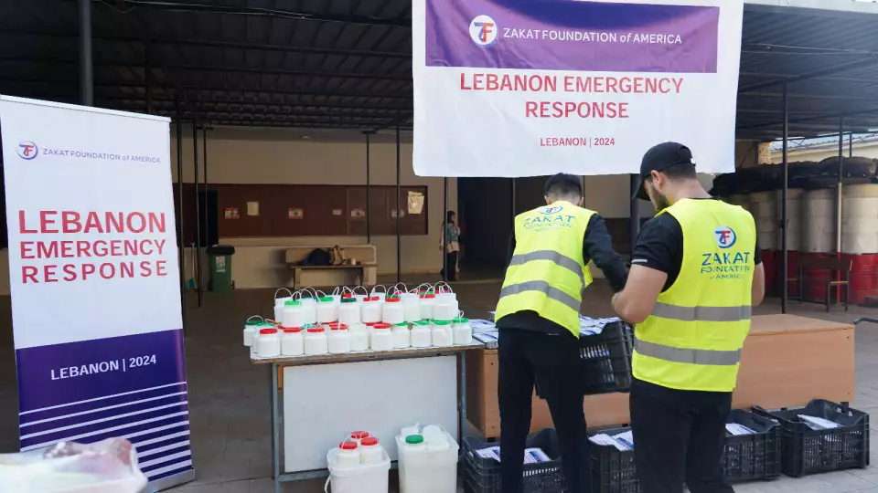 Our local Zakat Foundation of America workers setting up food distribution in Lebanon