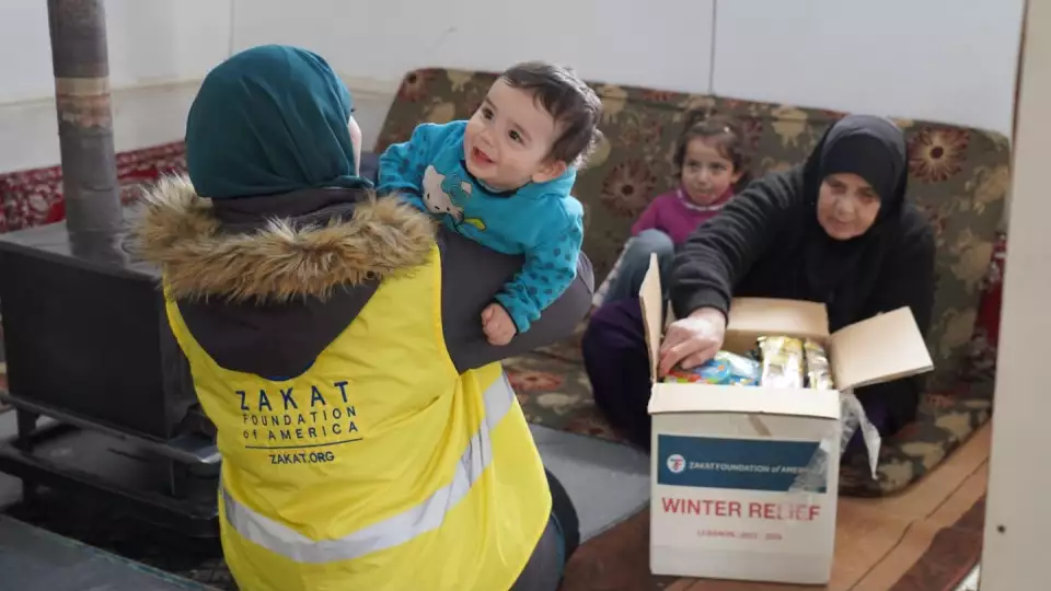 Donors through Zakat Foundation of America and help families survive harsh winters with blankets and other winter essentials