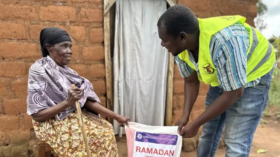 Our field rep makes a house visit to help a food insecure family in Tanzania.