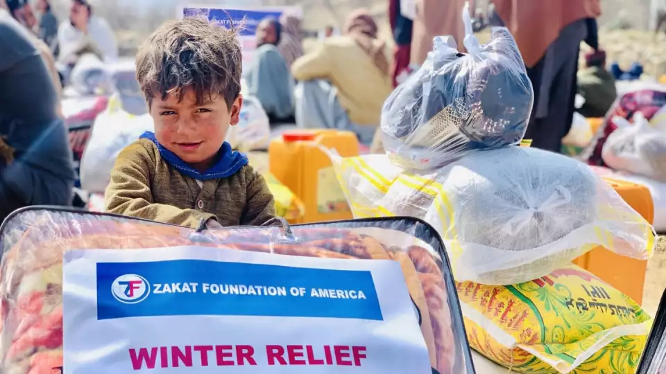 Blankets, coats and shoes provide soft comfort from the harsh winter climate. / توفر البطانيات، المعاطف، والأحذية حماية دافئة وراحة ناعمة من قسوة مناخ الشتاء.