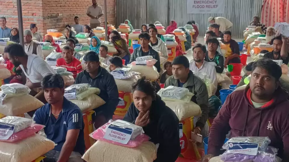 Those displaced by flooding in Nepal received food packages and emergency relief supplies