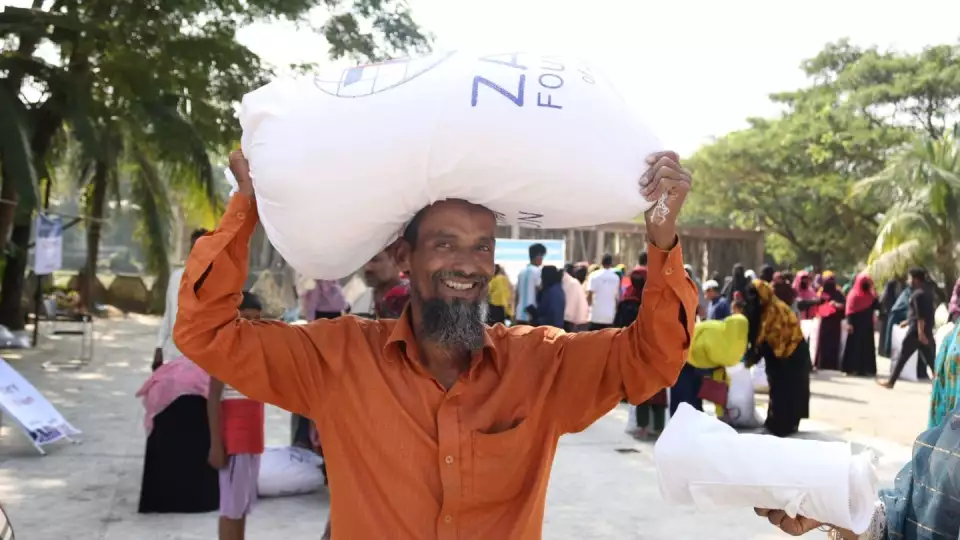 Rice distribution for families facing food insecurity in Bangladesh.