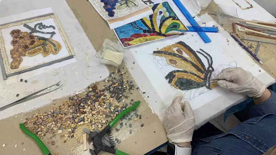 Our vocational training center in Amman, Jordan teaches a class on mosaics for a path to financial stability.