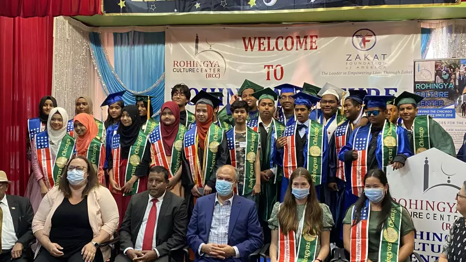 Rohingya Cultrual Center graduates pose for a picture to celebrate their accomplishments
