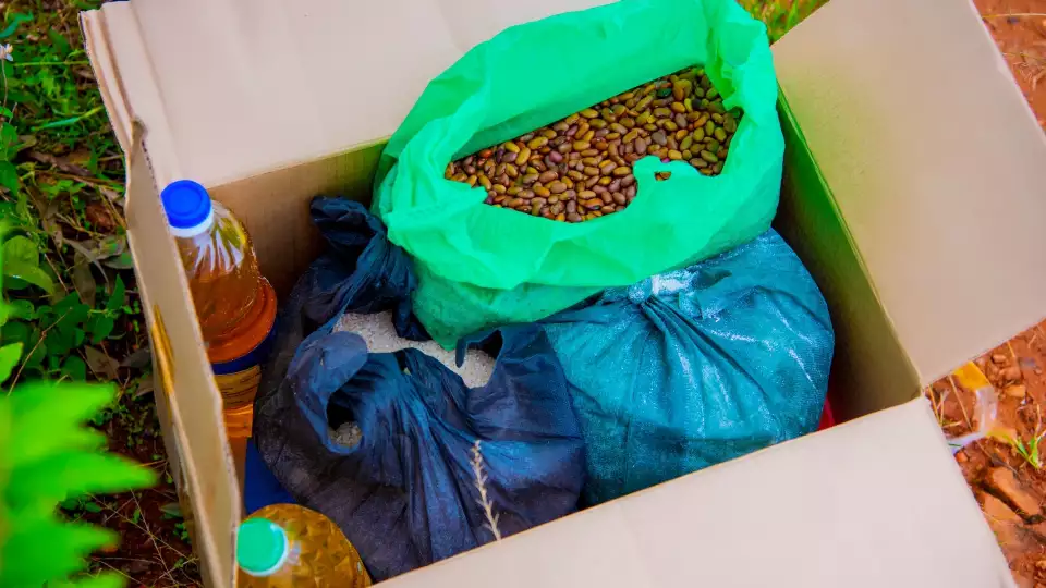 Food packages given to hunger stricken families in Burundi ensure household staples to make nourishing meals.