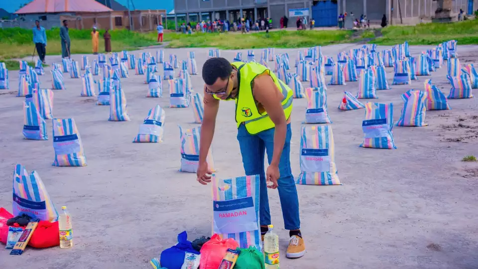 Our field rep prepares the food package distribution site in Burundi for families facing food insecurity.