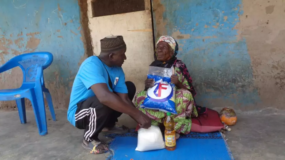 Our field rep sits with an elderly women during our Ramadan food package distribution. These heartfelt. moments bring hope and instill togetherness.