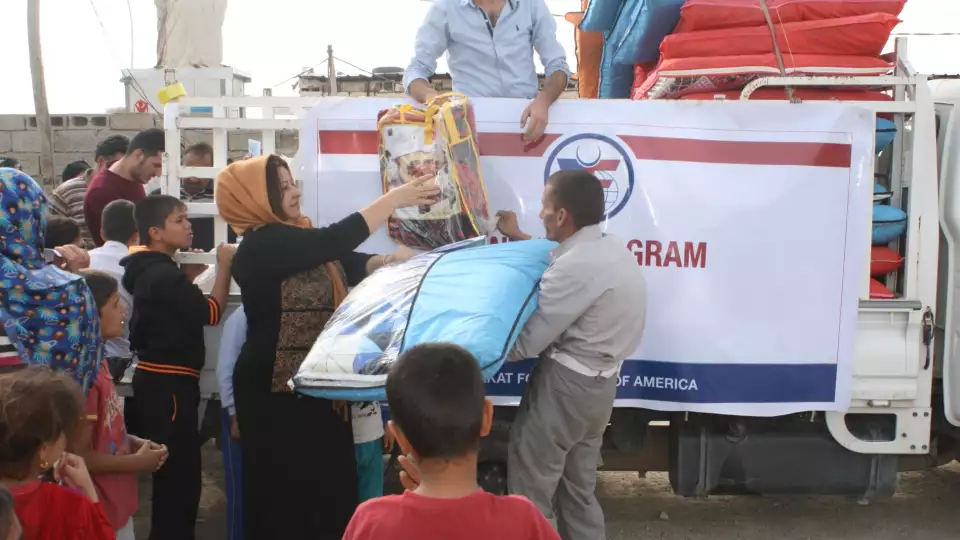 Warm blankets, coats, and more help families stay safe from winter weather in Iraq.