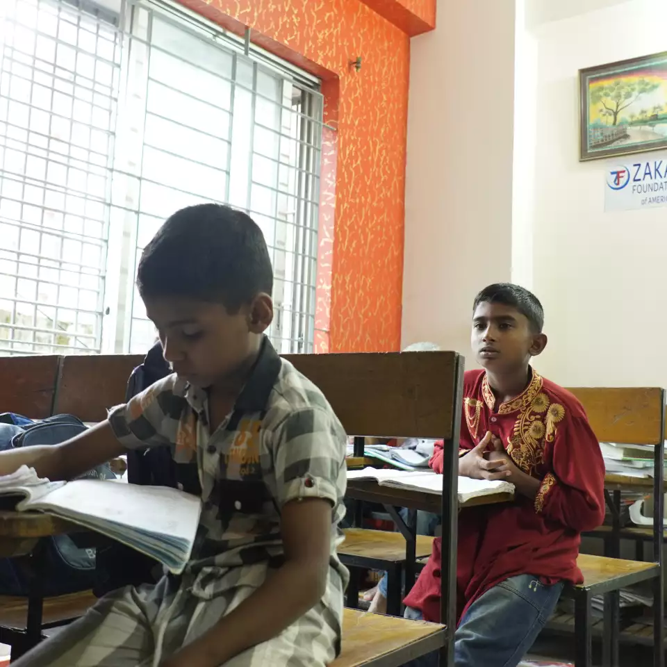 In Bangladesh, orphaned children attend classes at school to ensure a brighter future.