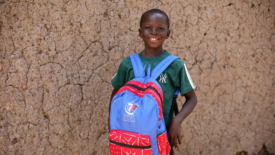 Orphan sponsorships will open doors to opportunities for this boy in Mali as he heads off to school.