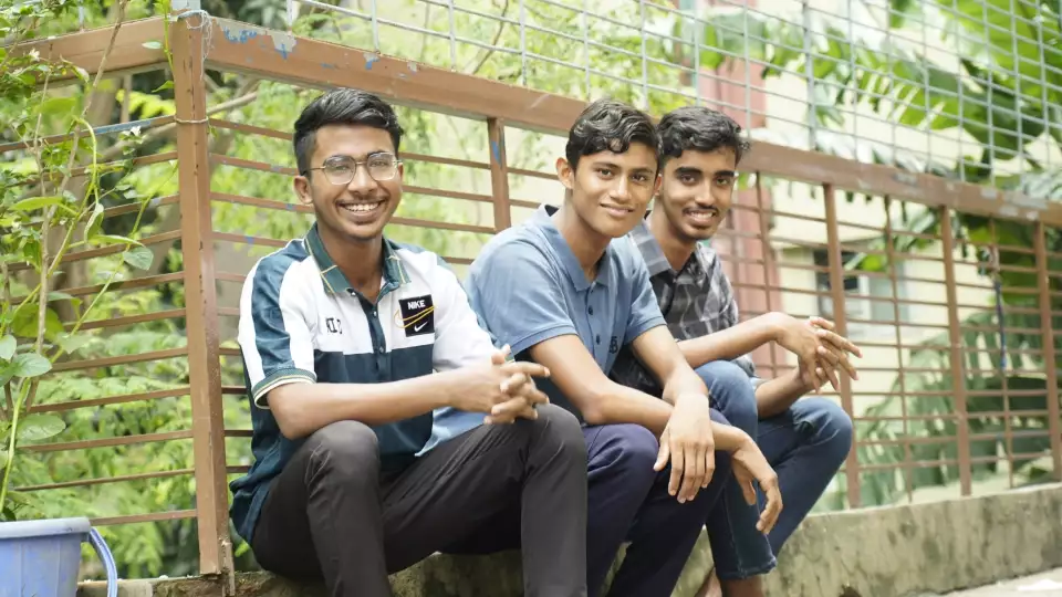 Smiles all around as sponsored orphaned teenagers in Bangladesh create lasting friendships.